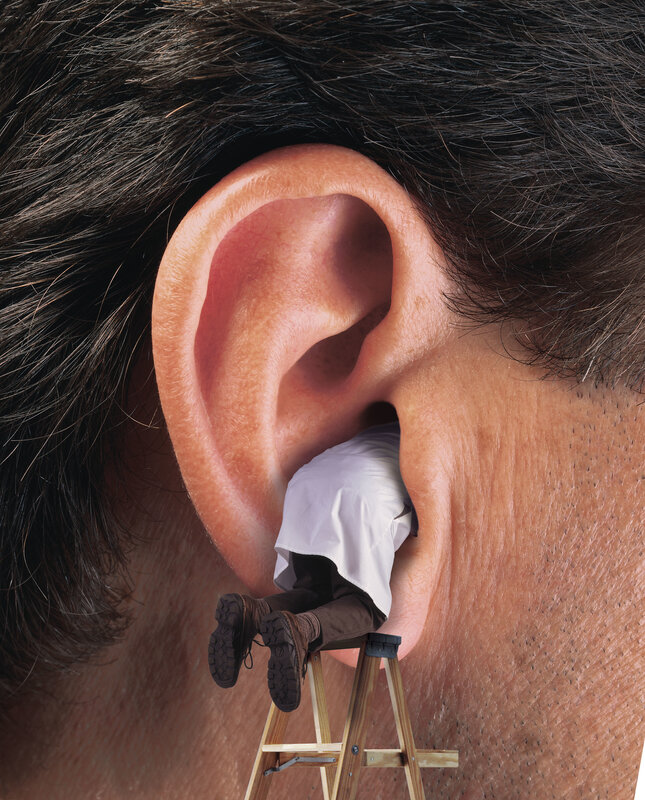 doctor entering ear on ladder