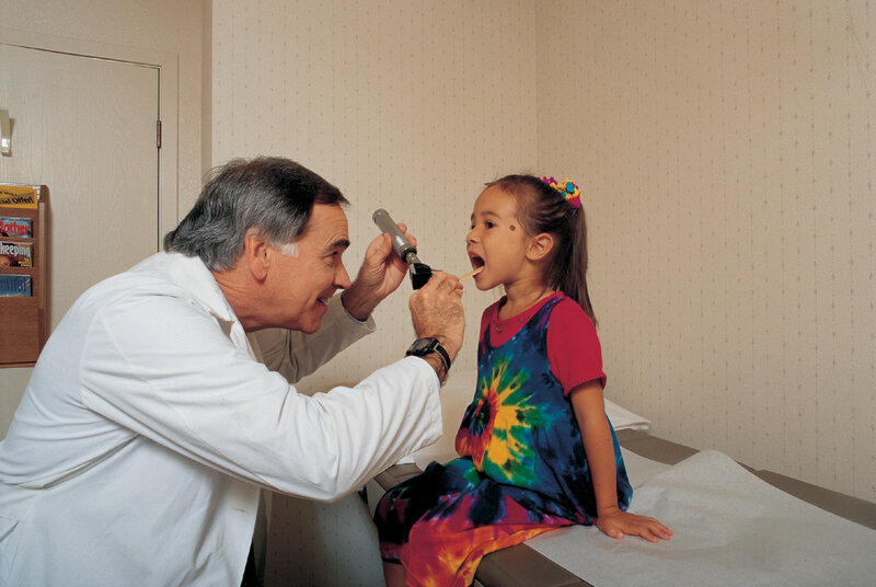 Doctor Examining Child