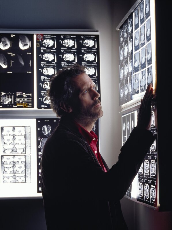 doctor examining medical scans