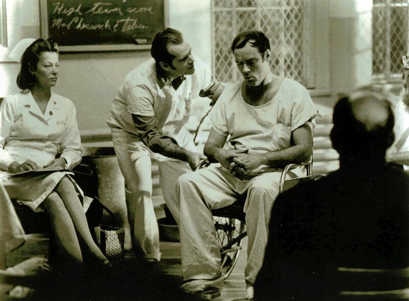 Doctor examining patient in hospital