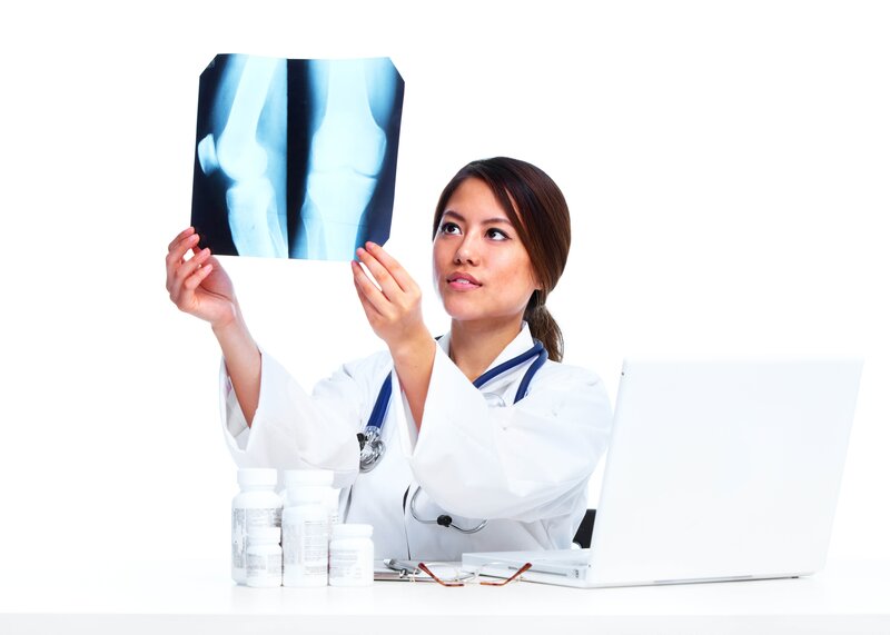 doctor examining x-ray