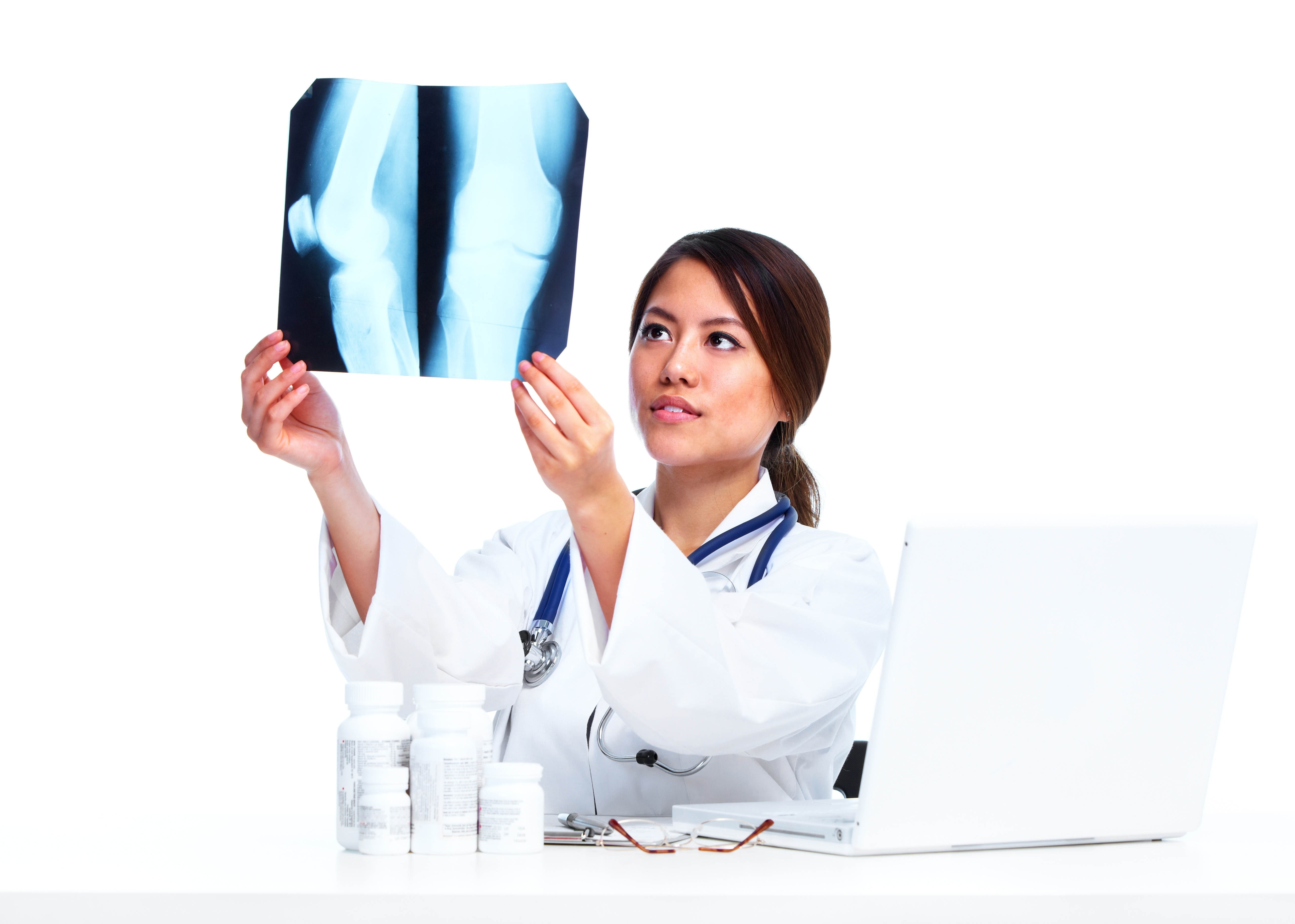 doctor examining x-ray