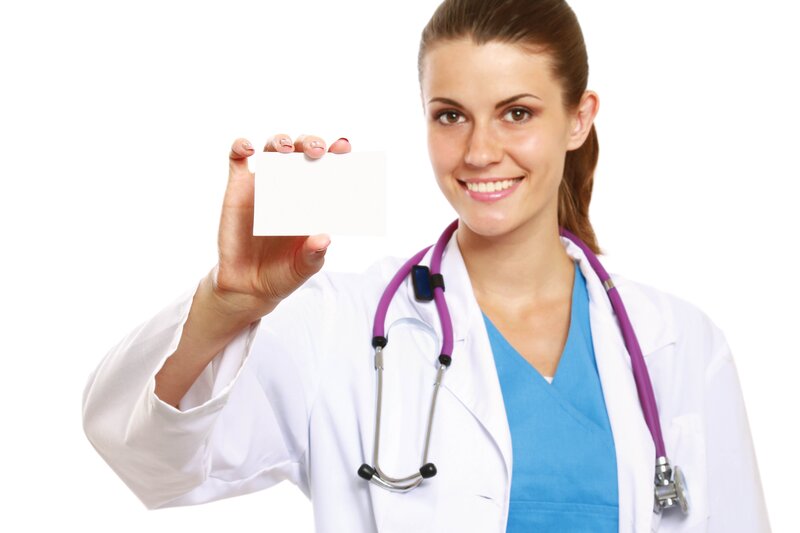 doctor holding blank card