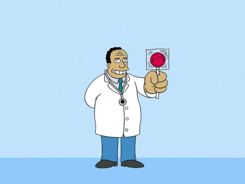 Doctor holding lollipop
