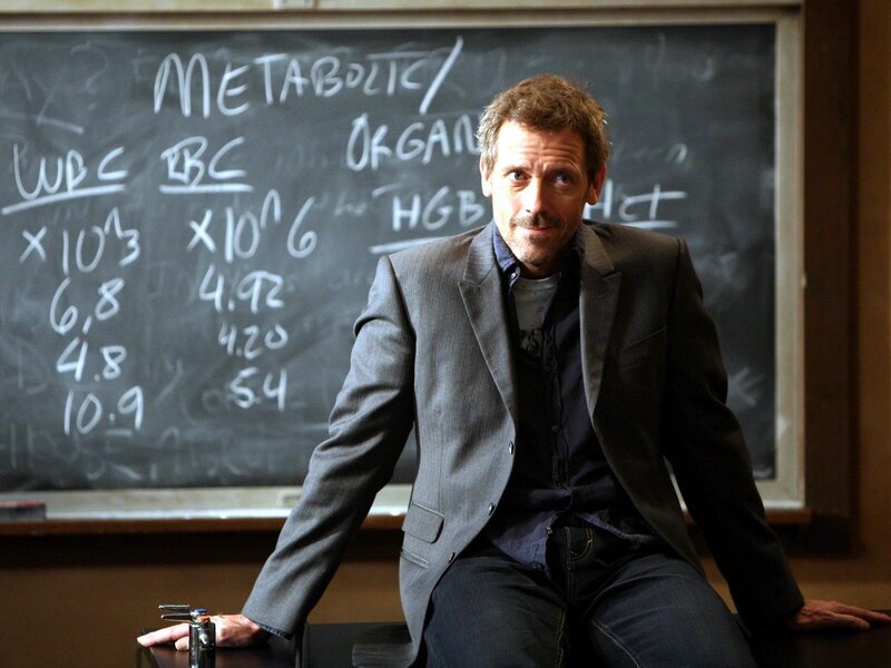 Doctor in front of chalkboard