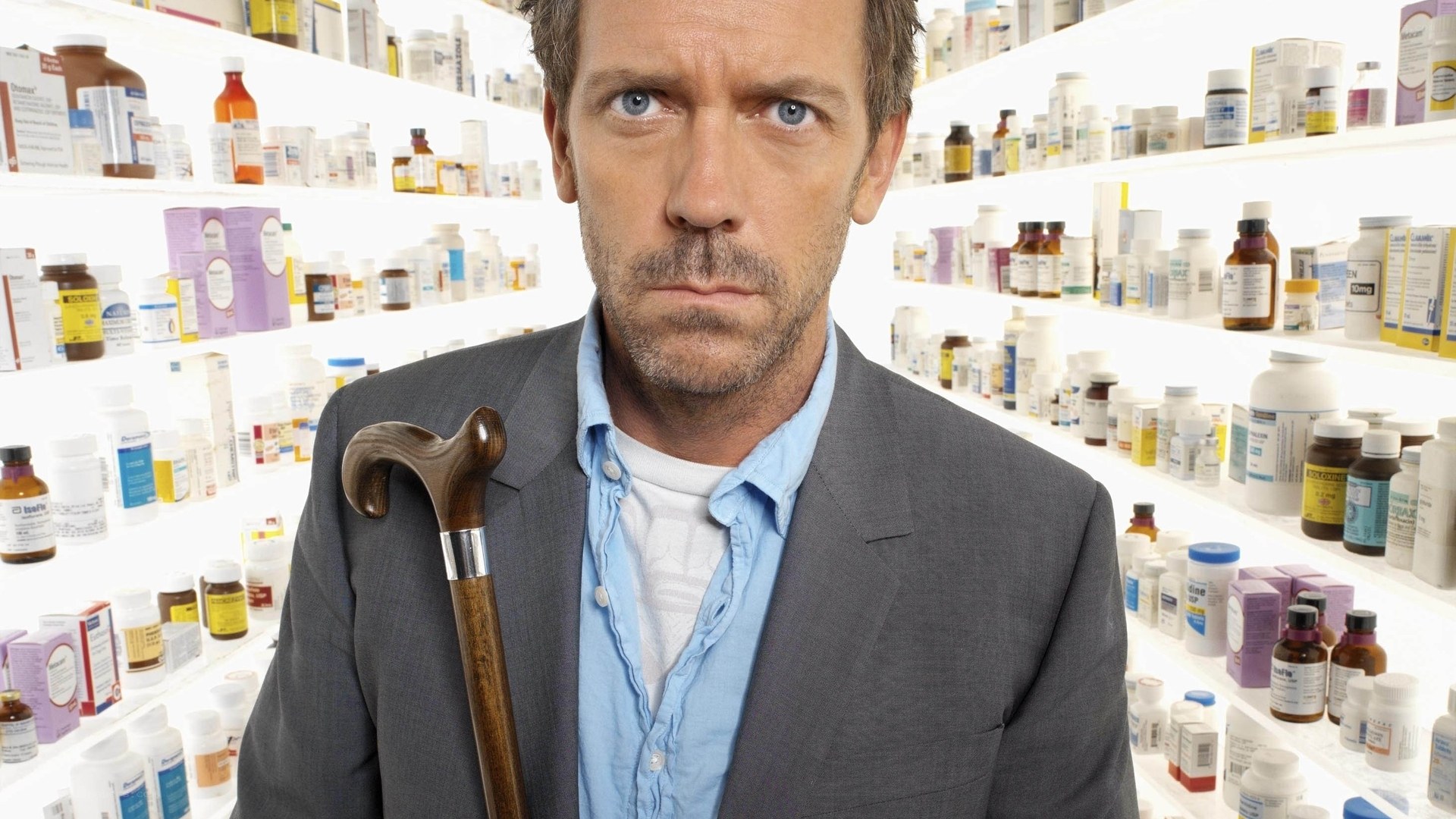 doctor in pharmacy with cane