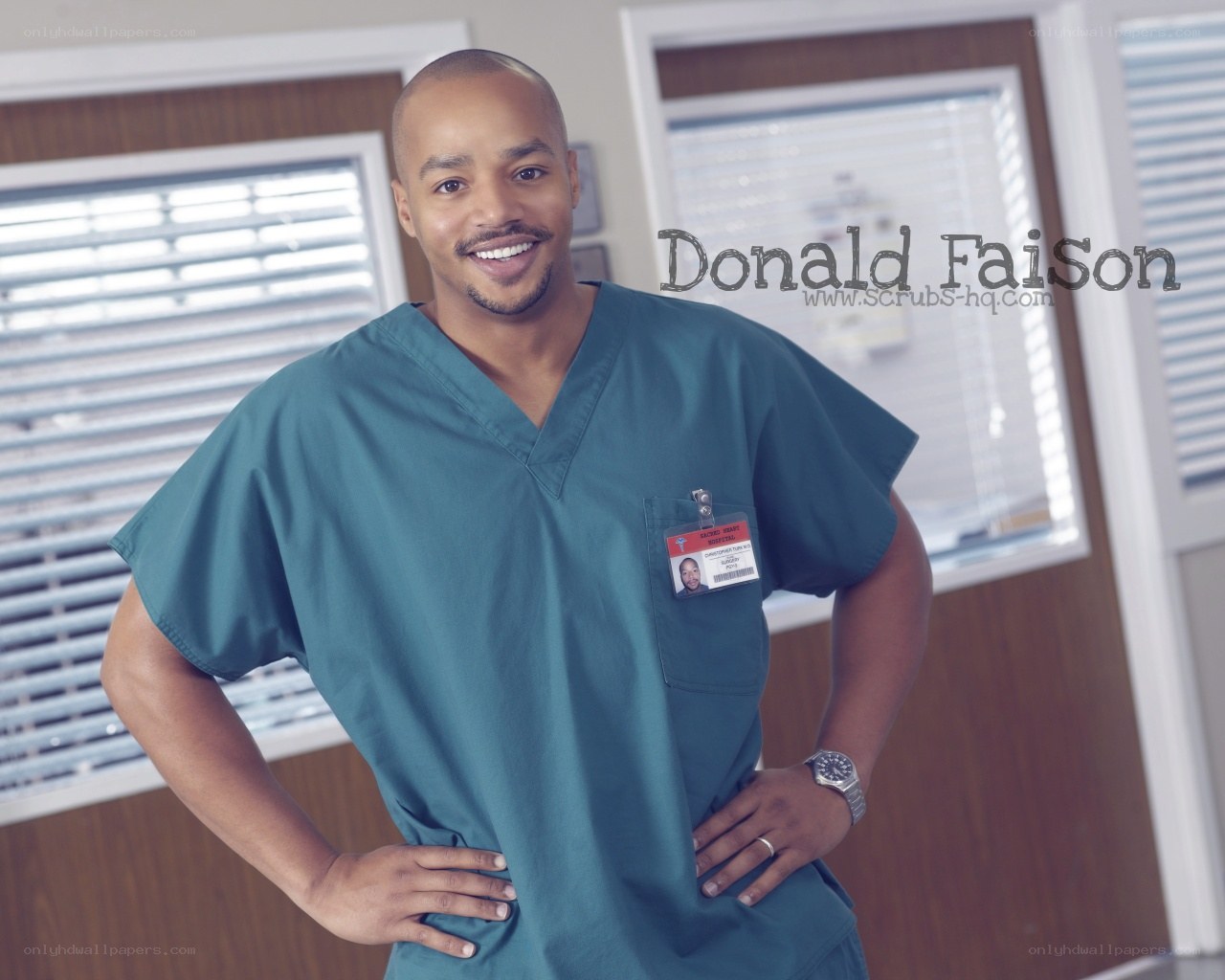 doctor in scrubs smiling