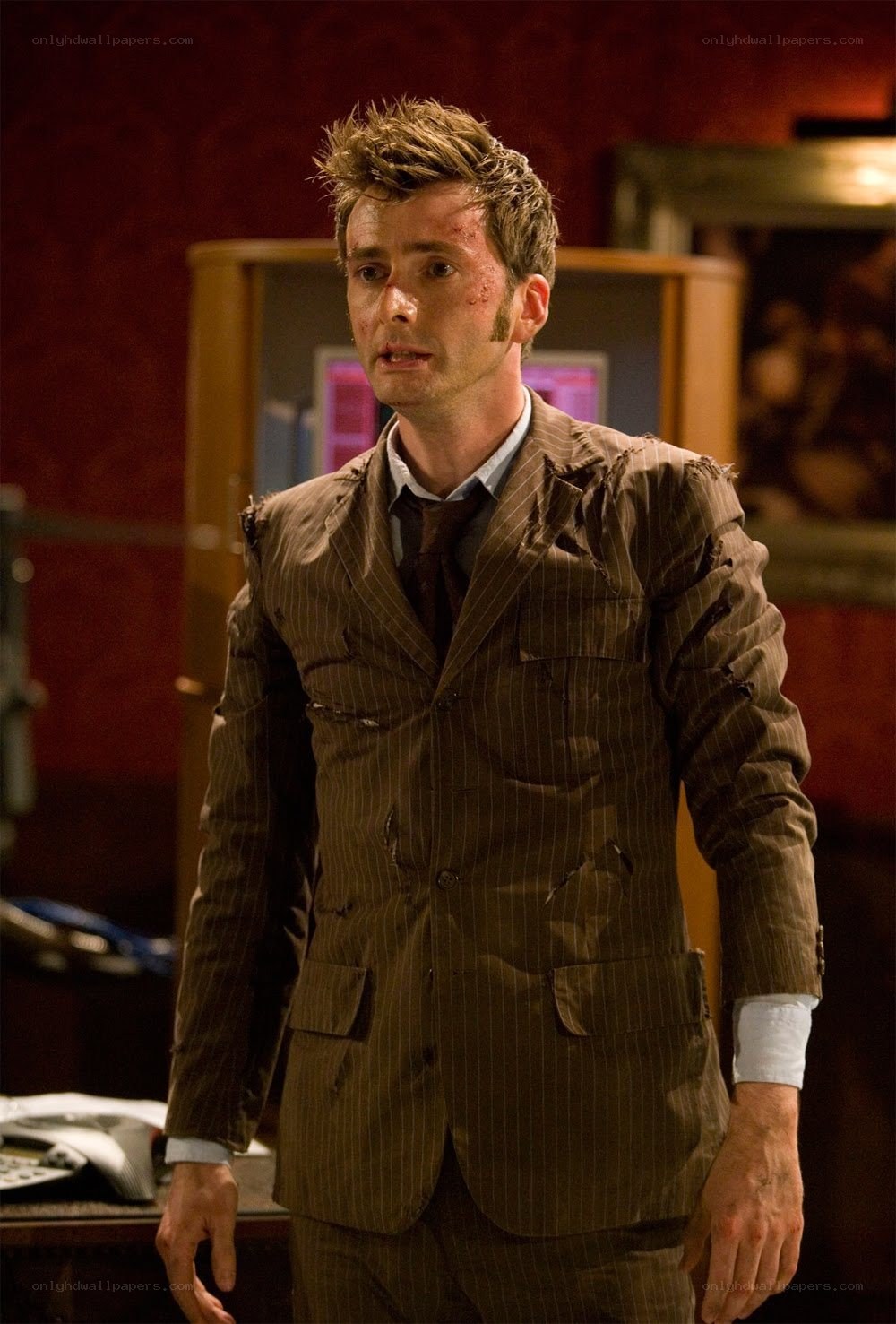 doctor in torn suit