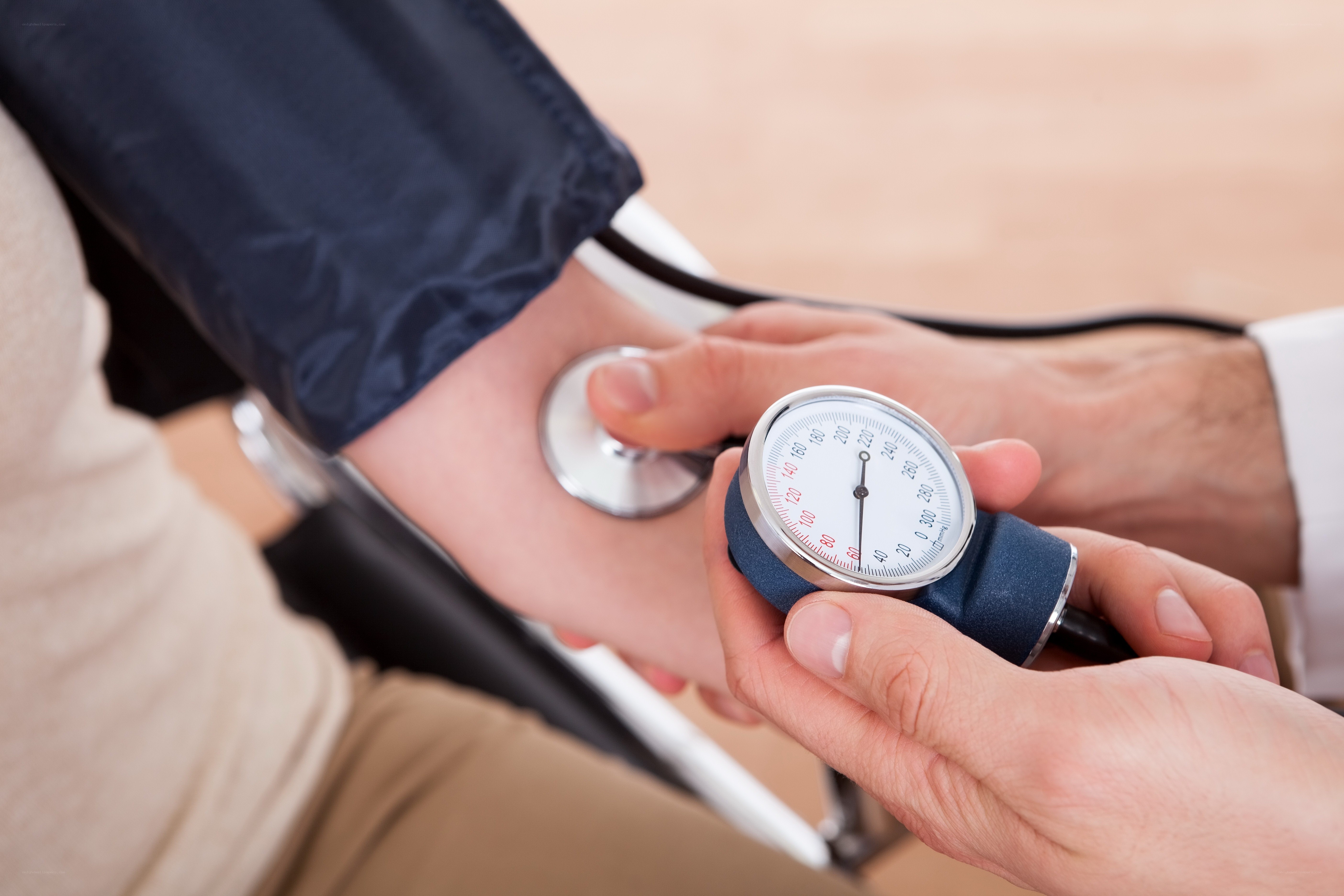 Doctor measuring blood pressure