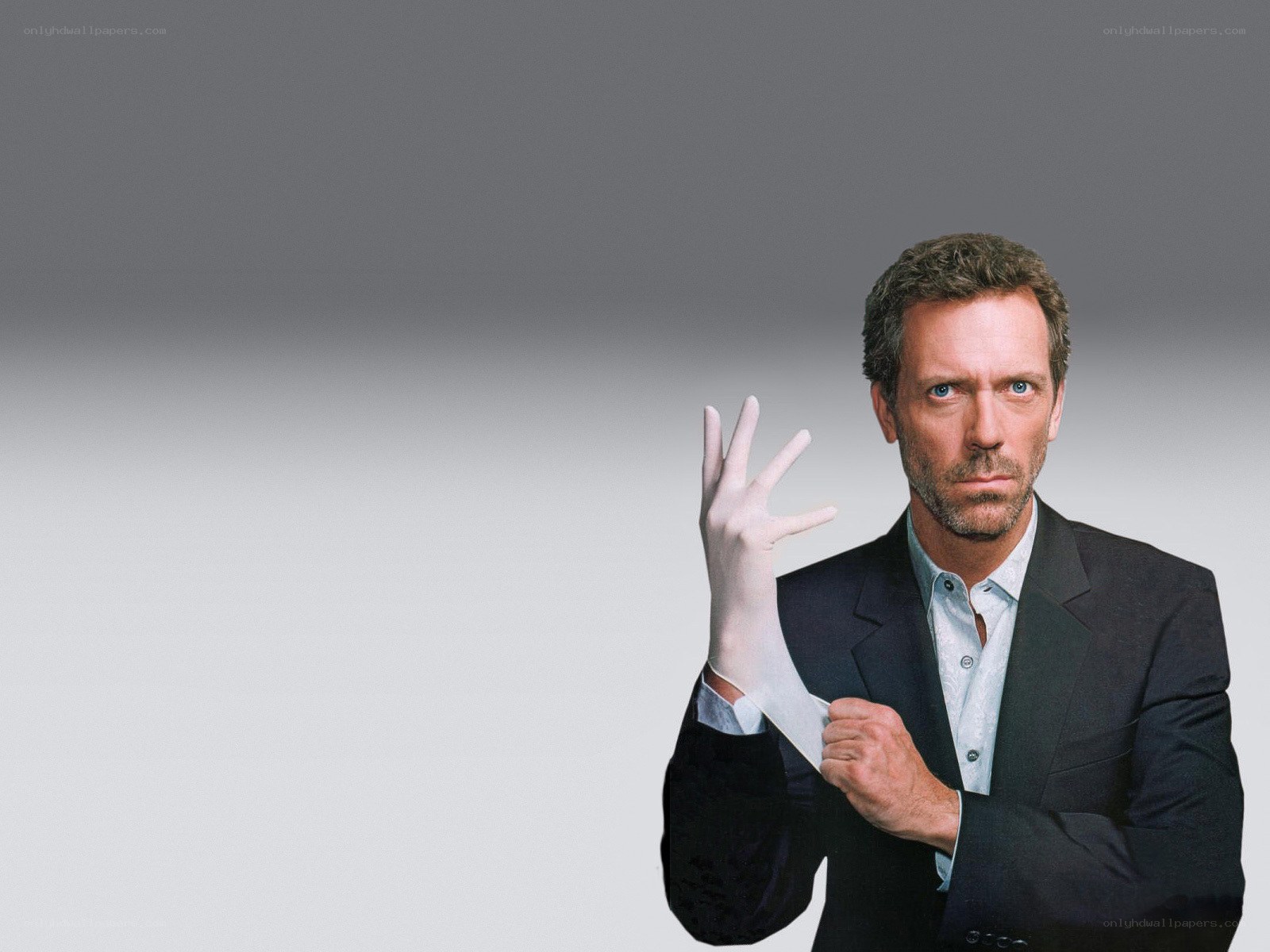 doctor putting on glove