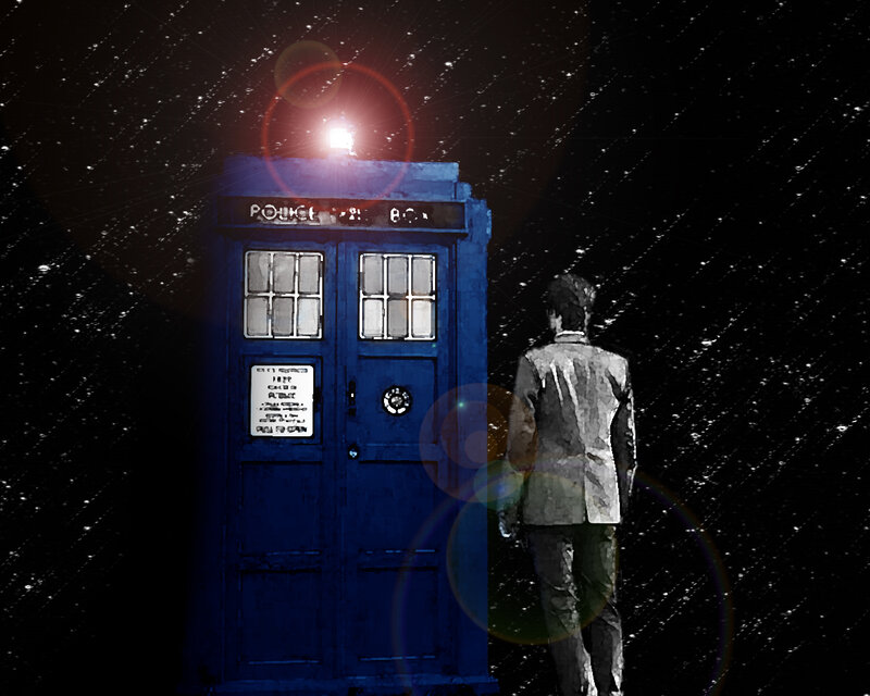 Doctor stands with TARDIS