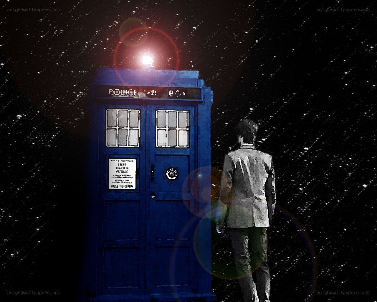 Doctor stands with TARDIS