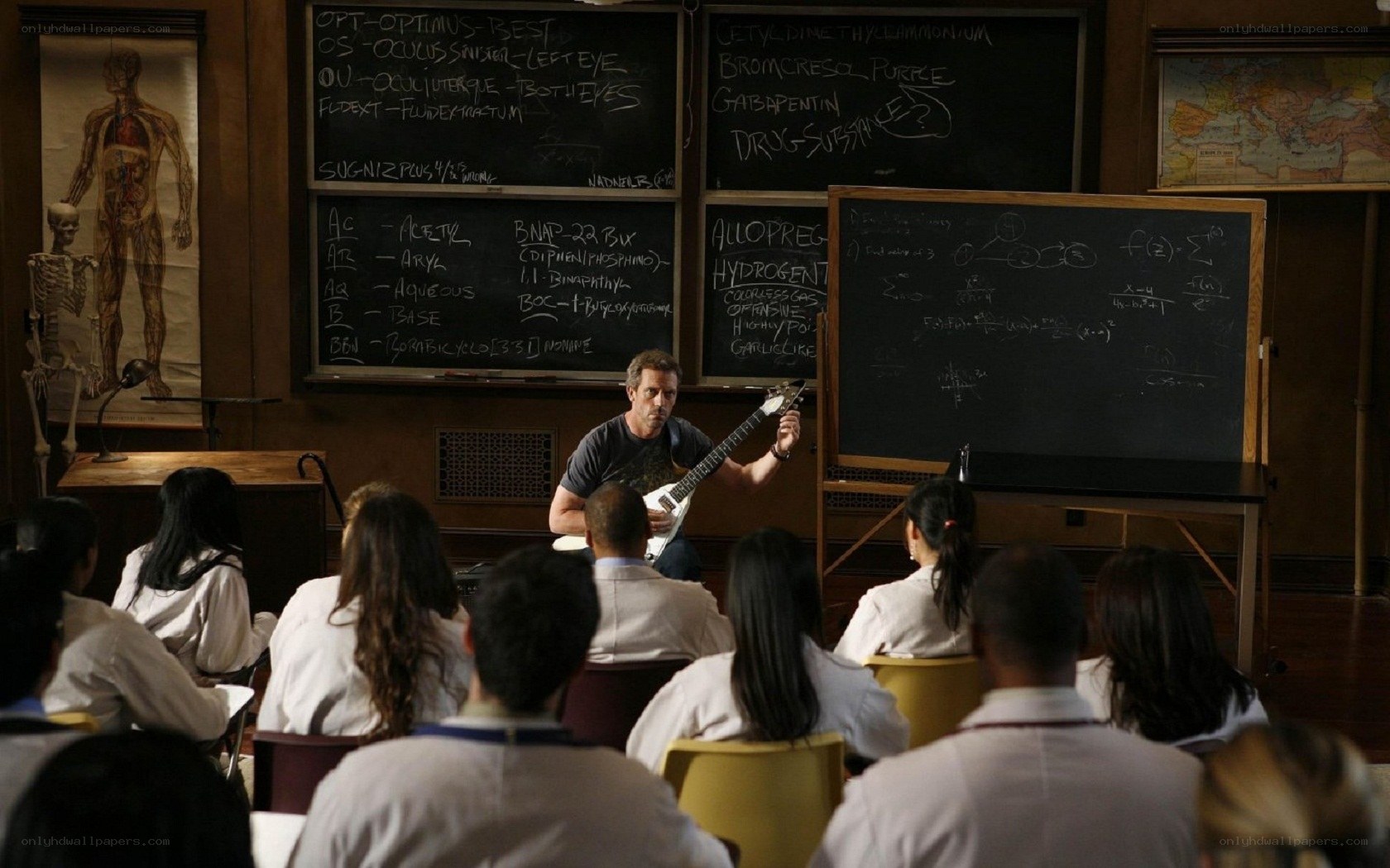 Doctor teaching with guitar