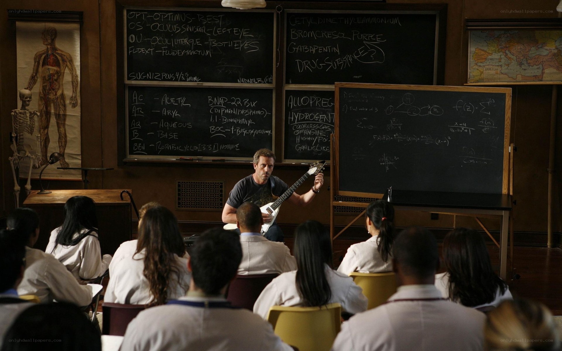 Doctor teaching with guitar
