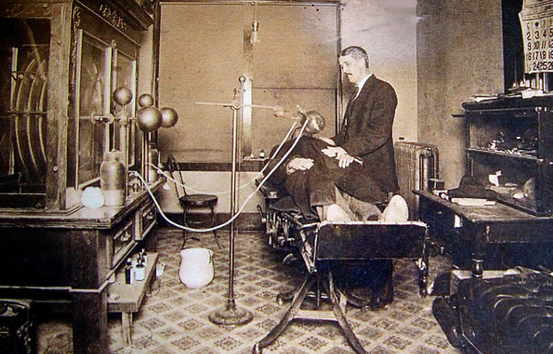 Doctor treating patient in old office