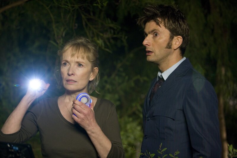 Doctor Who and companion in forest
