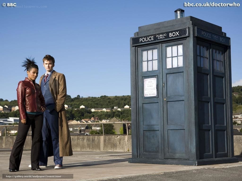Doctor Who and companion with TARDIS