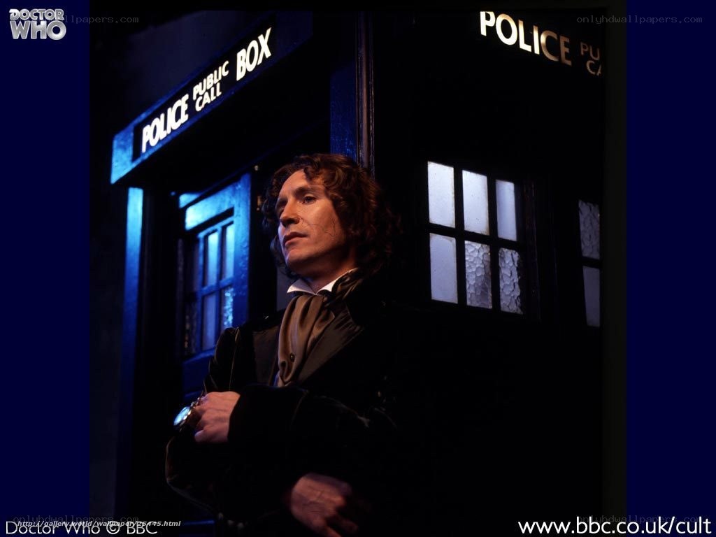 Doctor Who character in front of TARDIS