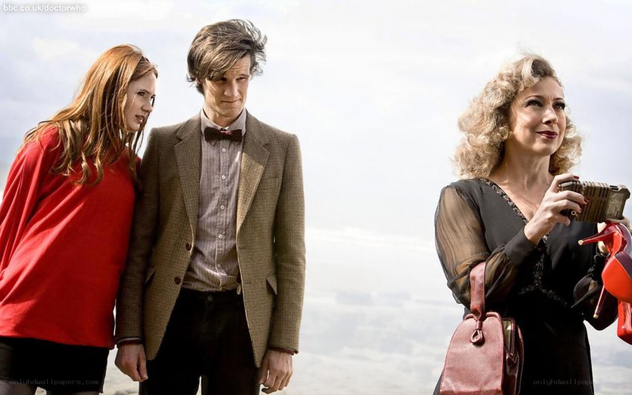 Doctor Who characters on a cliff