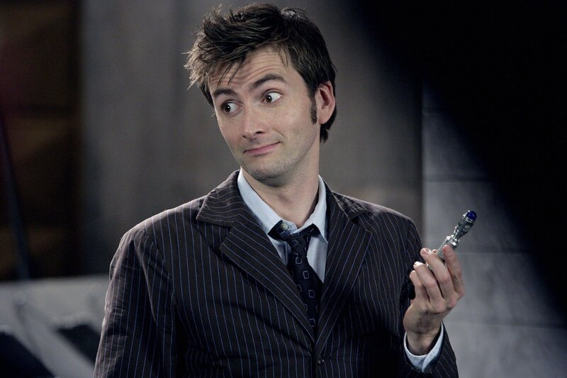Doctor Who holding sonic screwdriver