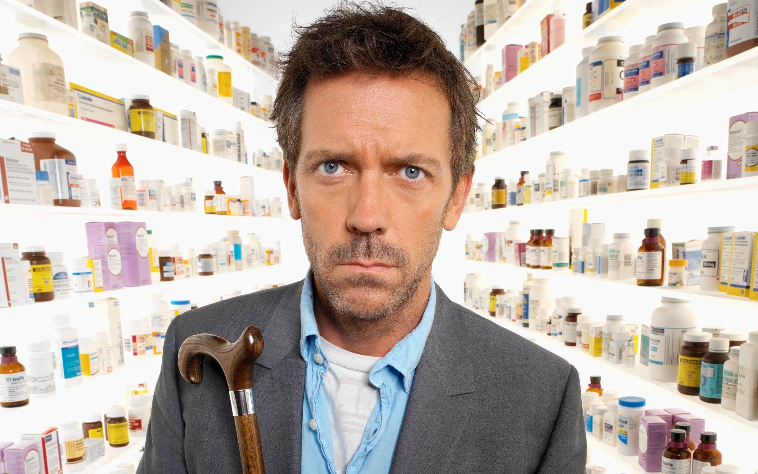 Doctor with cane in pharmacy