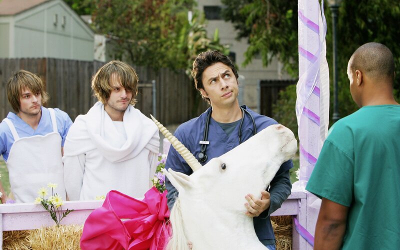 Doctors with unicorn prop