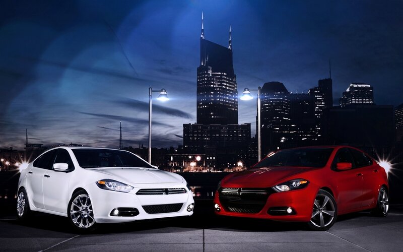 Dodge cars at night in city