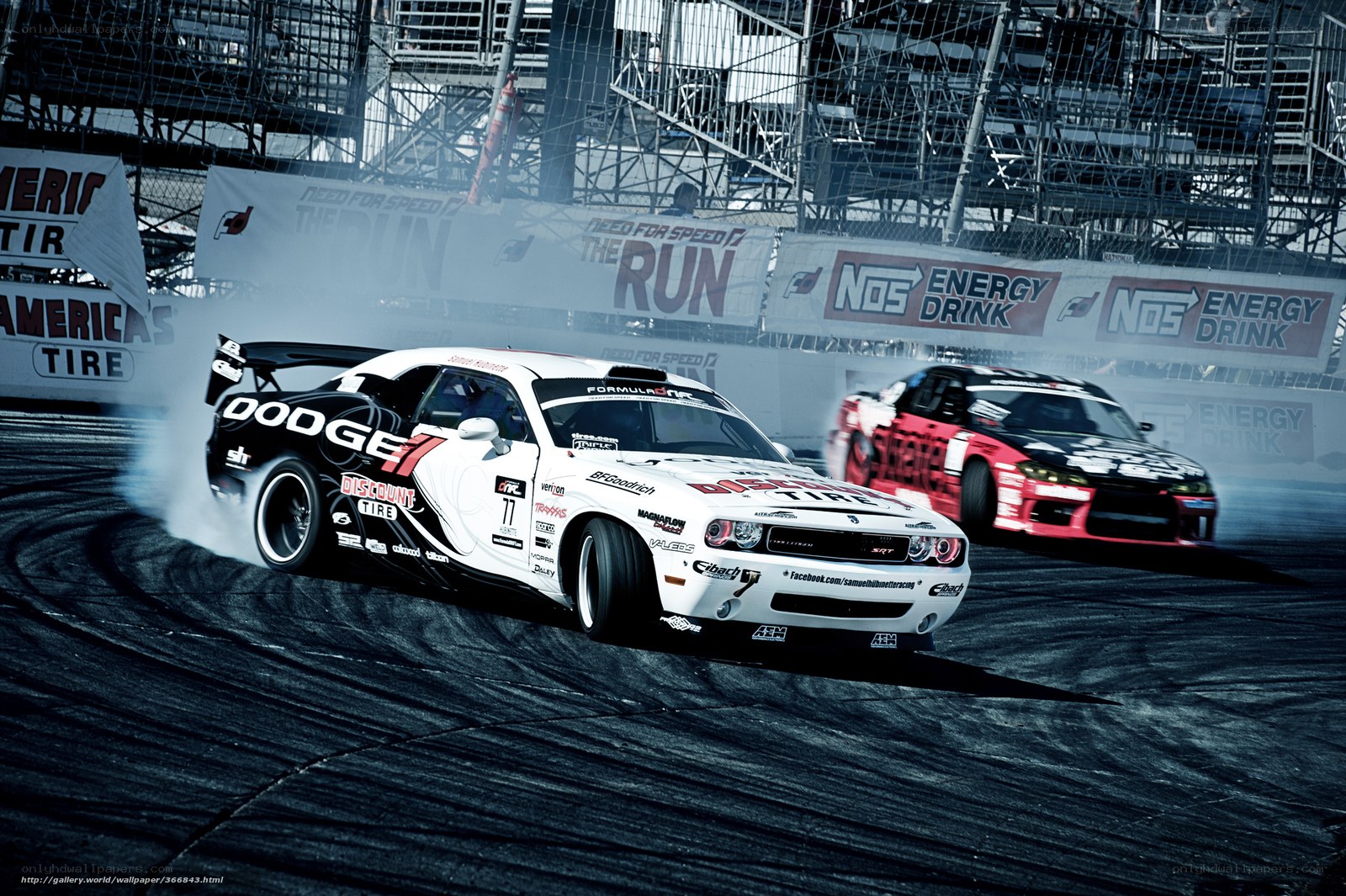 Dodge Challenger drifts at a race