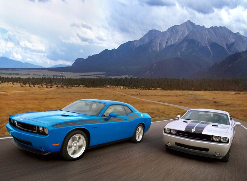 Dodge Challengers on a mountain road