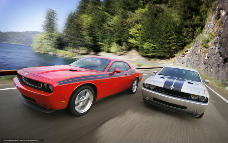 Dodge Challengers on coastal road