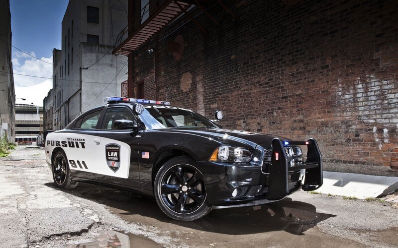 Dodge Charger police car in alley
