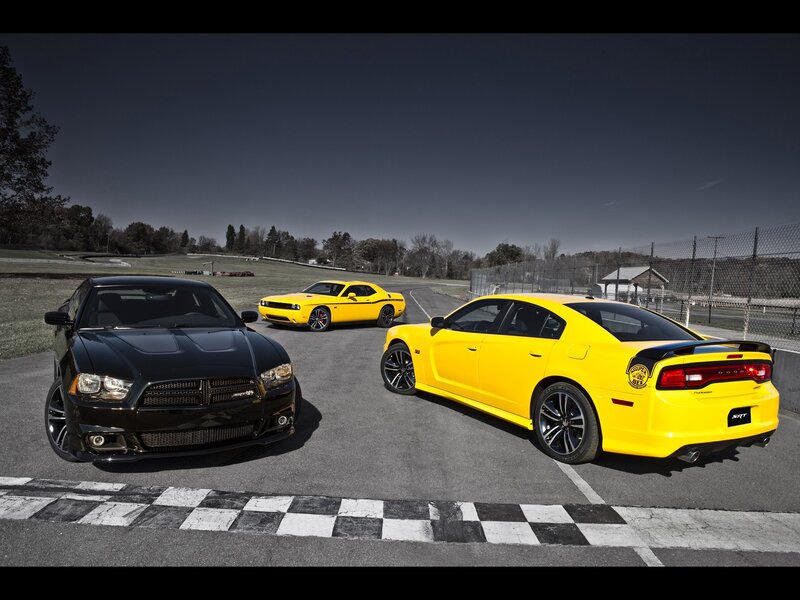 Dodge muscle cars on racetrack