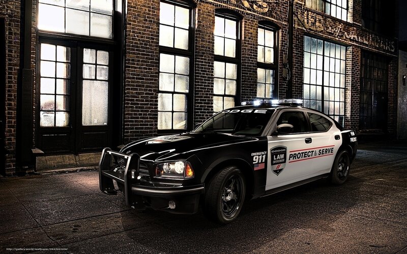 Dodge police car at night