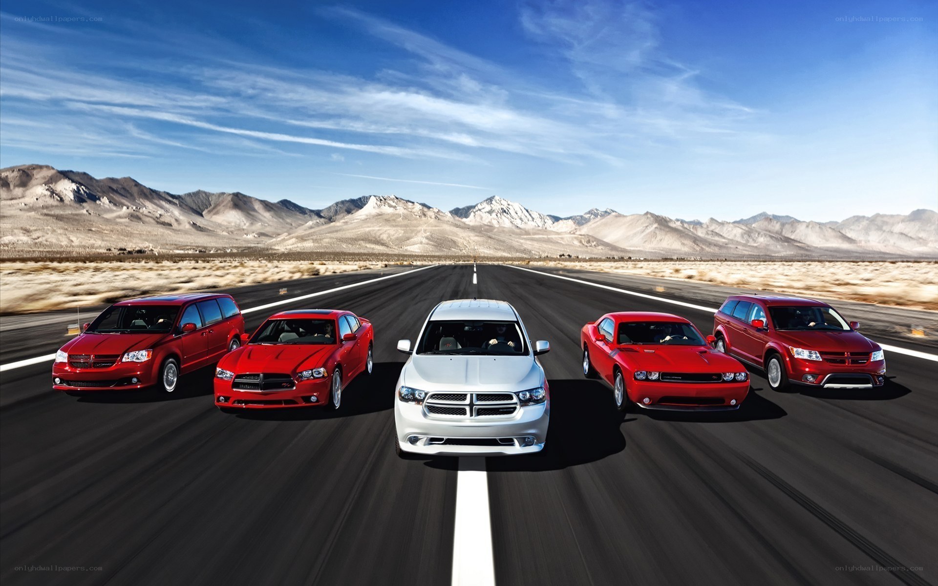 Dodge vehicles on a desert road