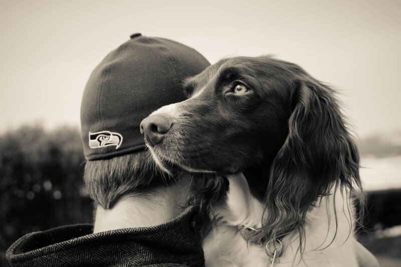 Dog and Person in Cap