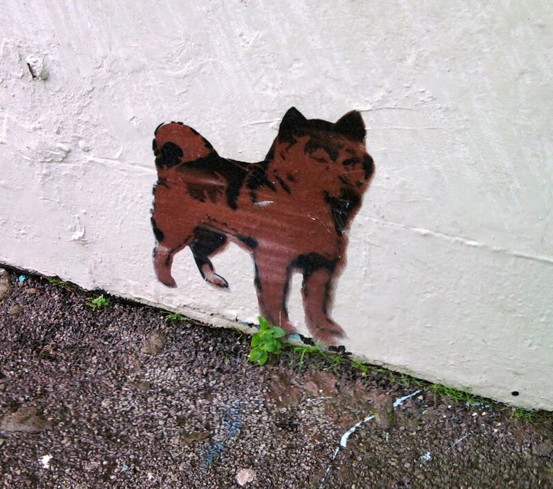 dog mural on wall