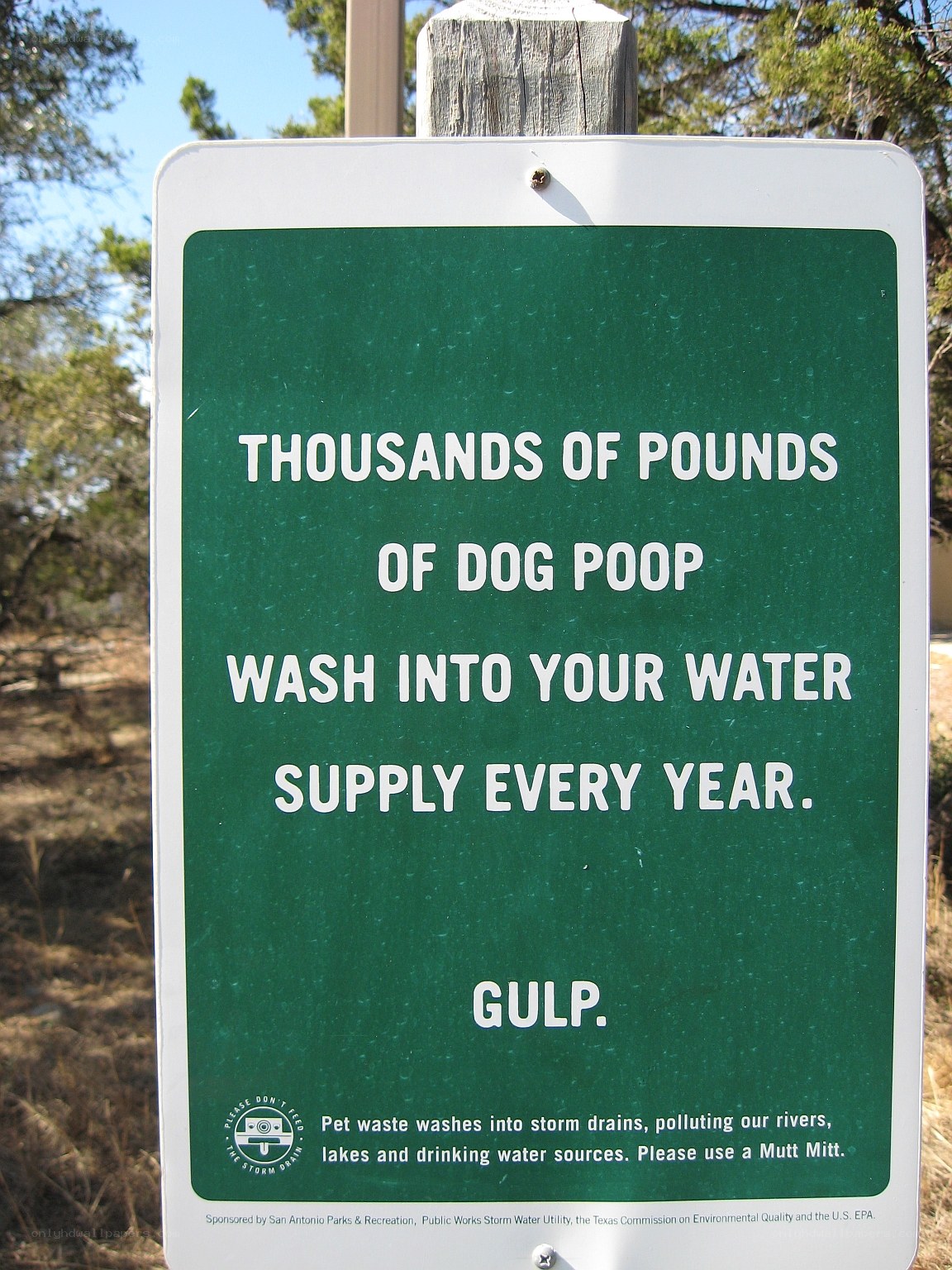 dog waste pollution sign
