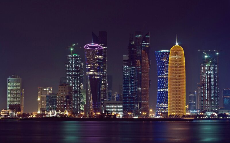 Doha Skyline at Night — Black, Dramatic, Photograph, Skyscrapers, Water
