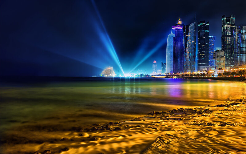 Doha Skyline at Night — Blue, Dramatic, Photograph, Skyscrapers, Beach