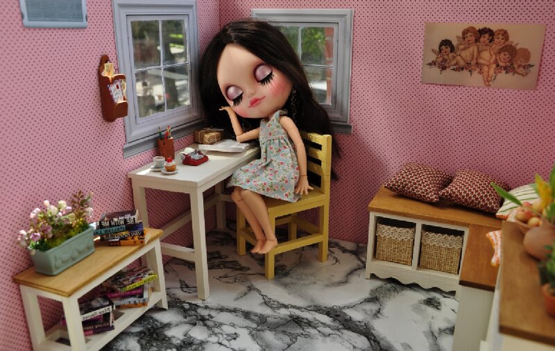 Doll at a Desk