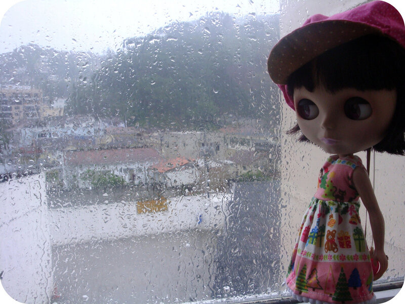 Doll by Rainy Window