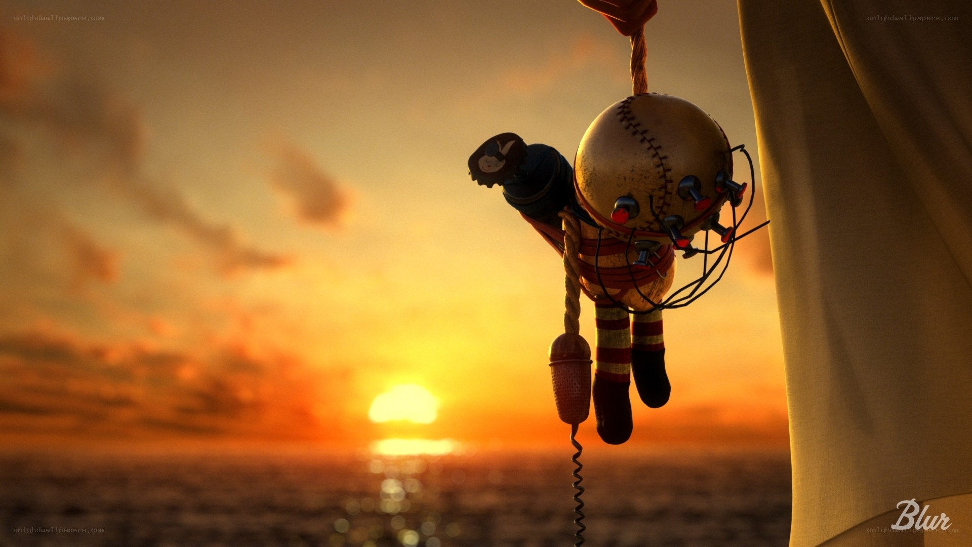 doll hanging at sunset