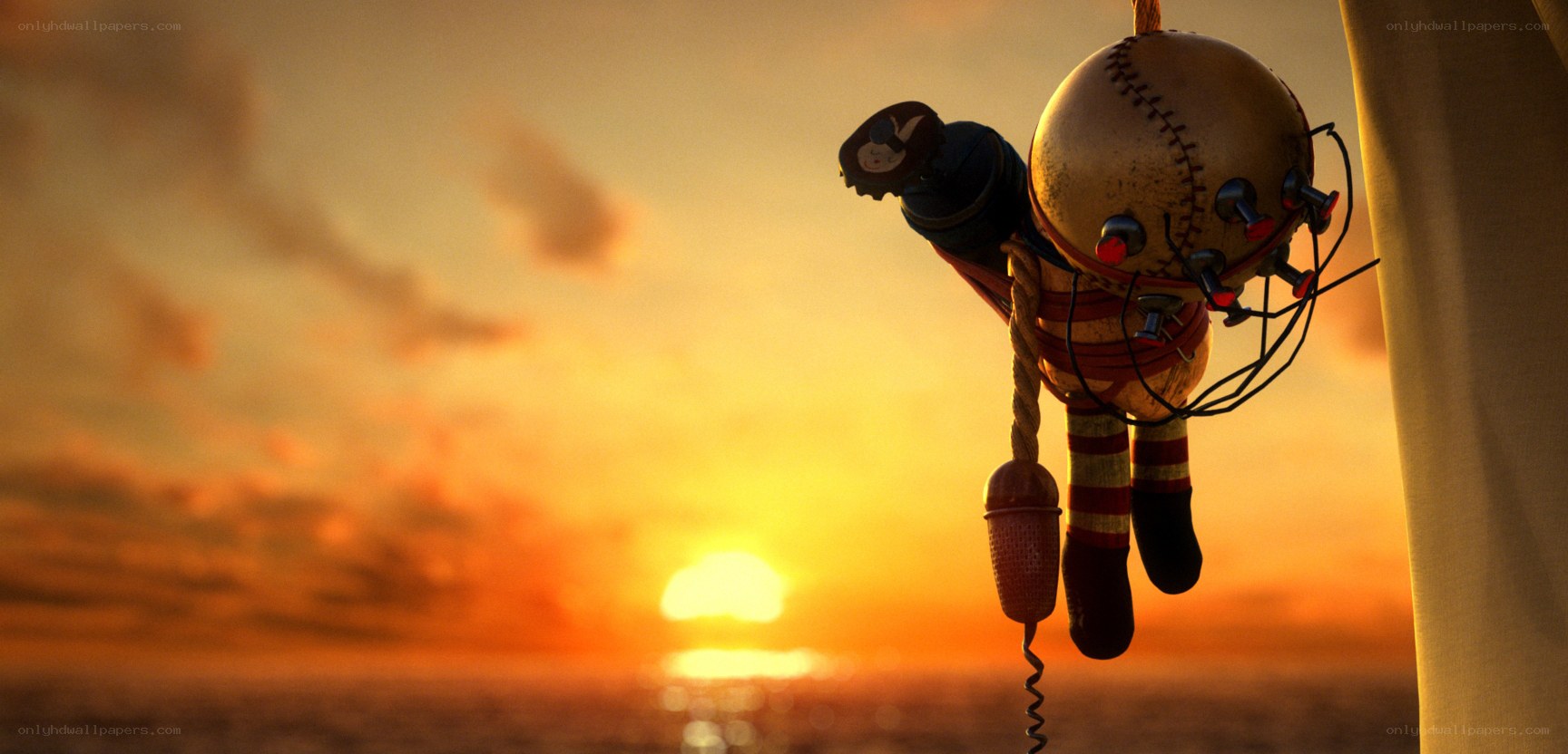 doll hanging at sunset