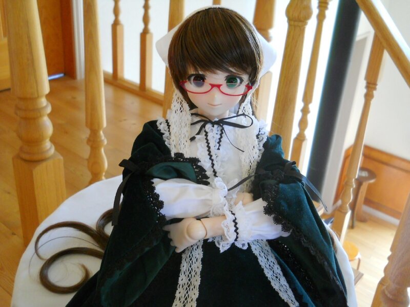 doll in a green dress