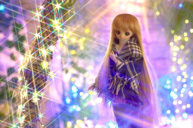 doll in festive lights