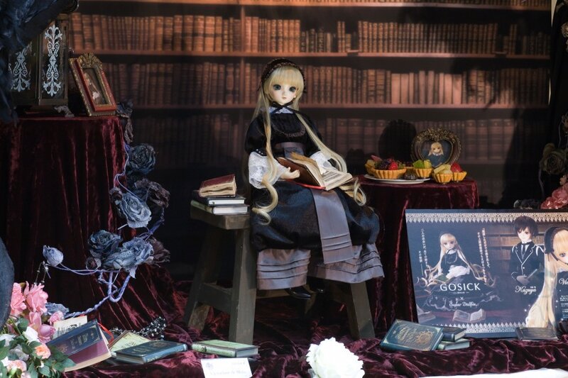 doll in library display