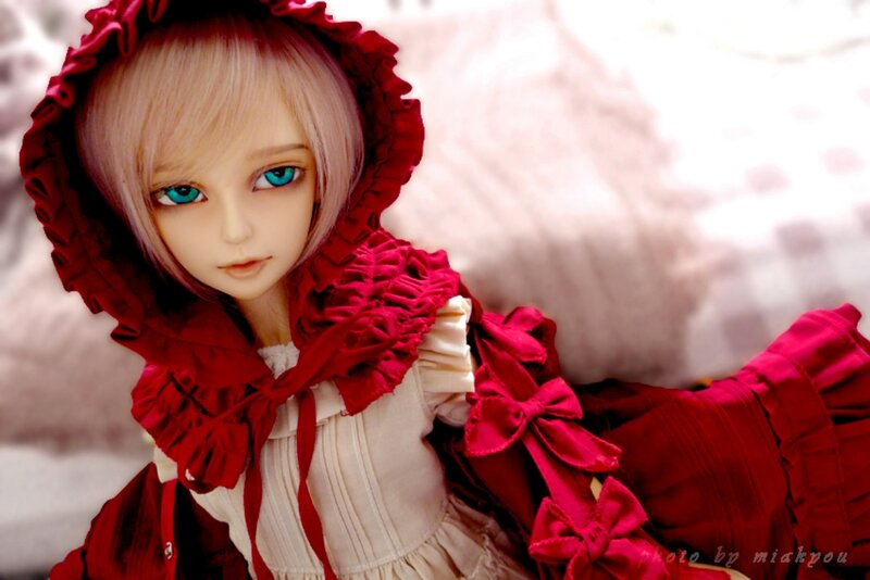 Doll in Red Hooded Dress