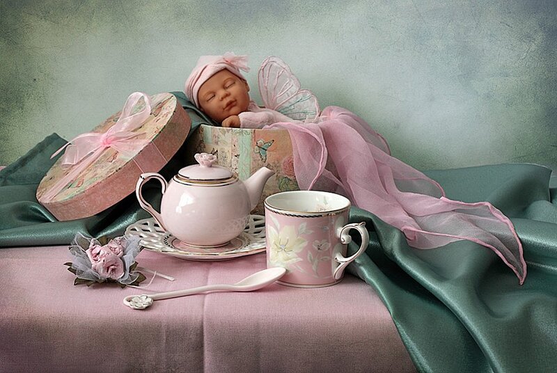 Doll in Tea Set