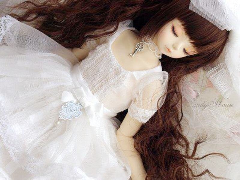 Doll in White Dress — Serene