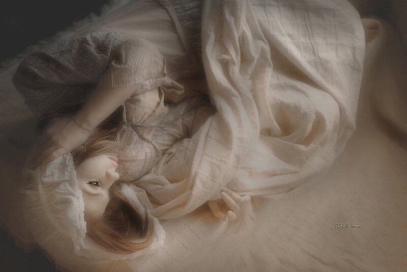 Doll Lying in Bed